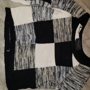 Checkered black, white, and grey cropped sweater